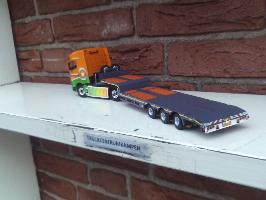 WSI  Volvo  FH5  Globetrotter  van  van  der  Vlist, Hobby en Vrije tijd, Modelauto's | 1:50, Ophalen of Verzenden, Nieuw, Bus of Vrachtwagen
