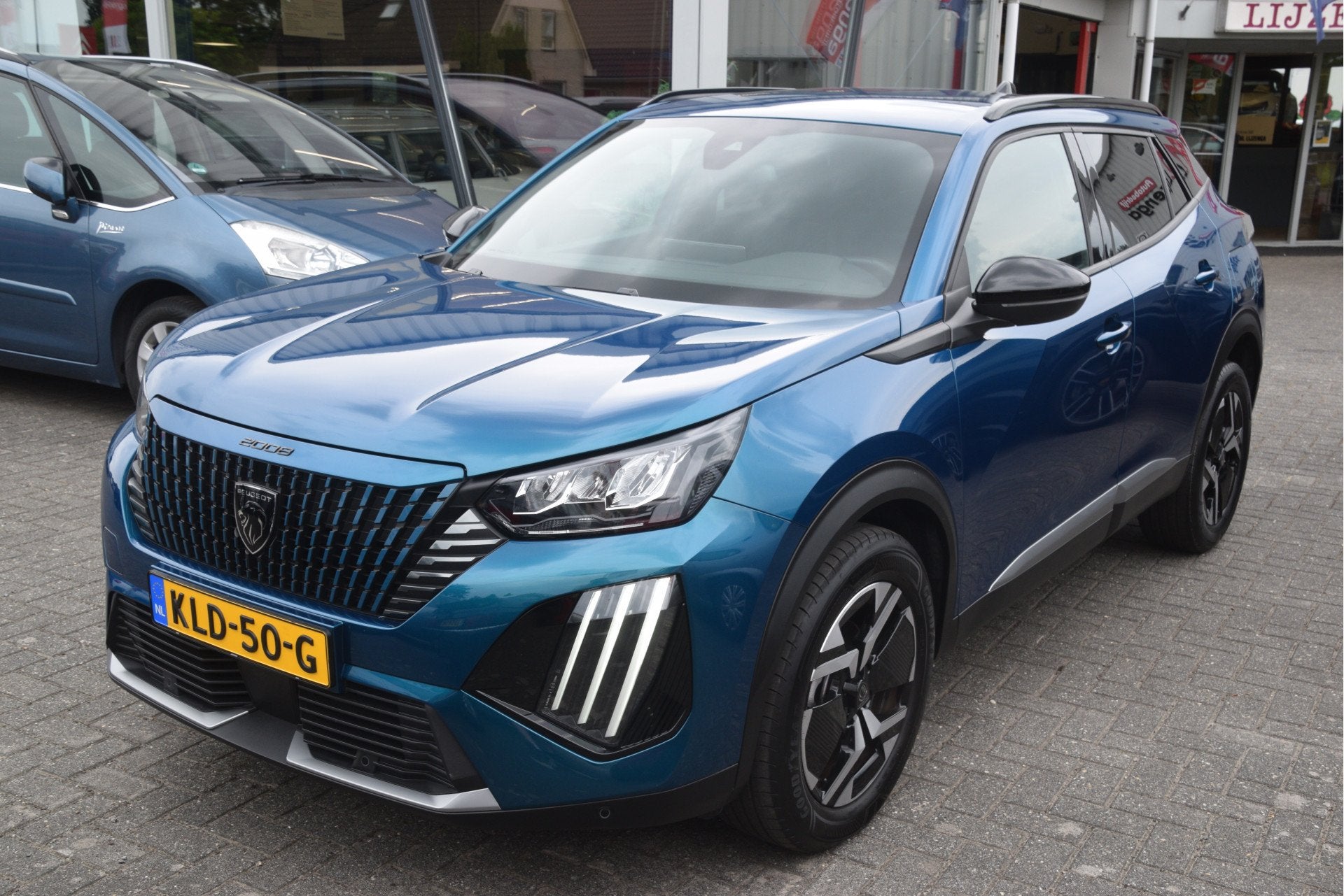 Peugeot 2008 1.2 PureTech 100 Allure Carplay | LED | Clima |, Auto's, Gebruikt, Euro 6, 1199 cc, Blauw
