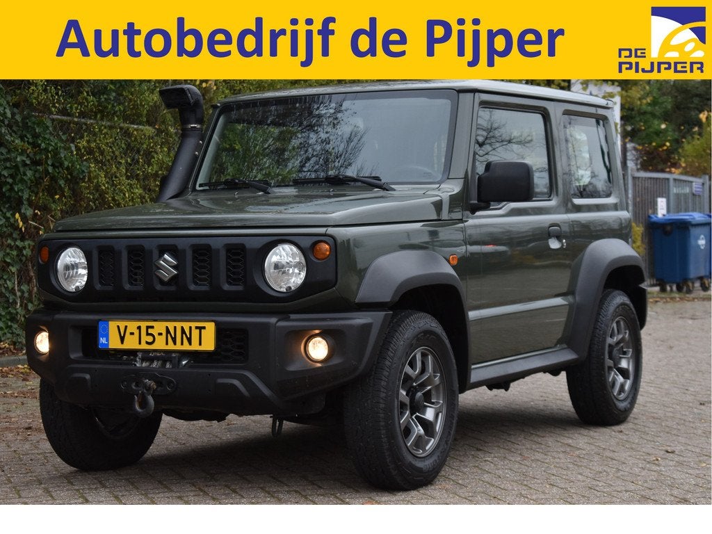 Suzuki Jimny Professional 4x4 Allgrip | Grijs kenteken | Ex., Auto's, Bestelauto's, 12 maanden, Stof, Gebruikt, 4 cilinders