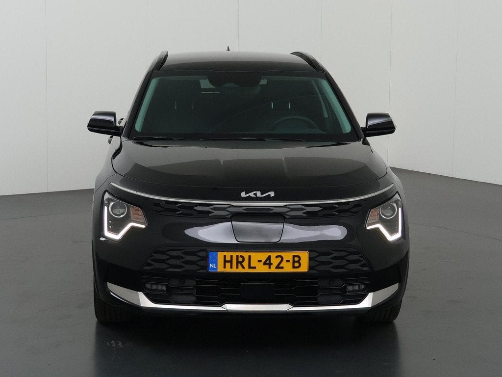 Kia Niro EV Light Advanced 64.8 kWh | Stoel verwarming | App, Auto's, Kia, Gebruikt, 750 kg, 1657 kg, Leder en Stof