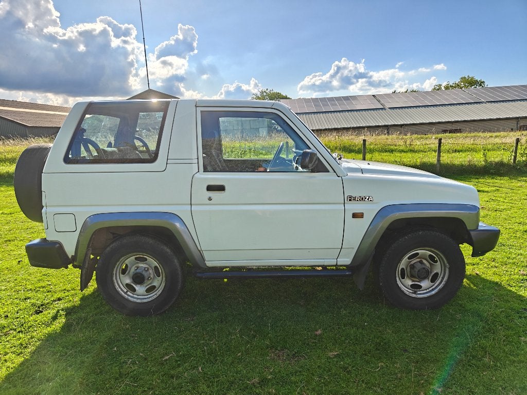 Daihatsu Feroza 1.6i Resintop 4WD 1997 Wit, Stof, 1590 cc, Wit, Origineel Nederlands