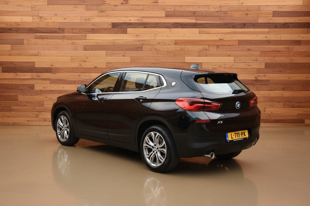 BMW X2 sDrive18i | SPORT STOELEN | 18"LMV | TREKHAAK, Auto's, BMW, Gebruikt, Met garantie (alle), Zwart, 3 cilinders