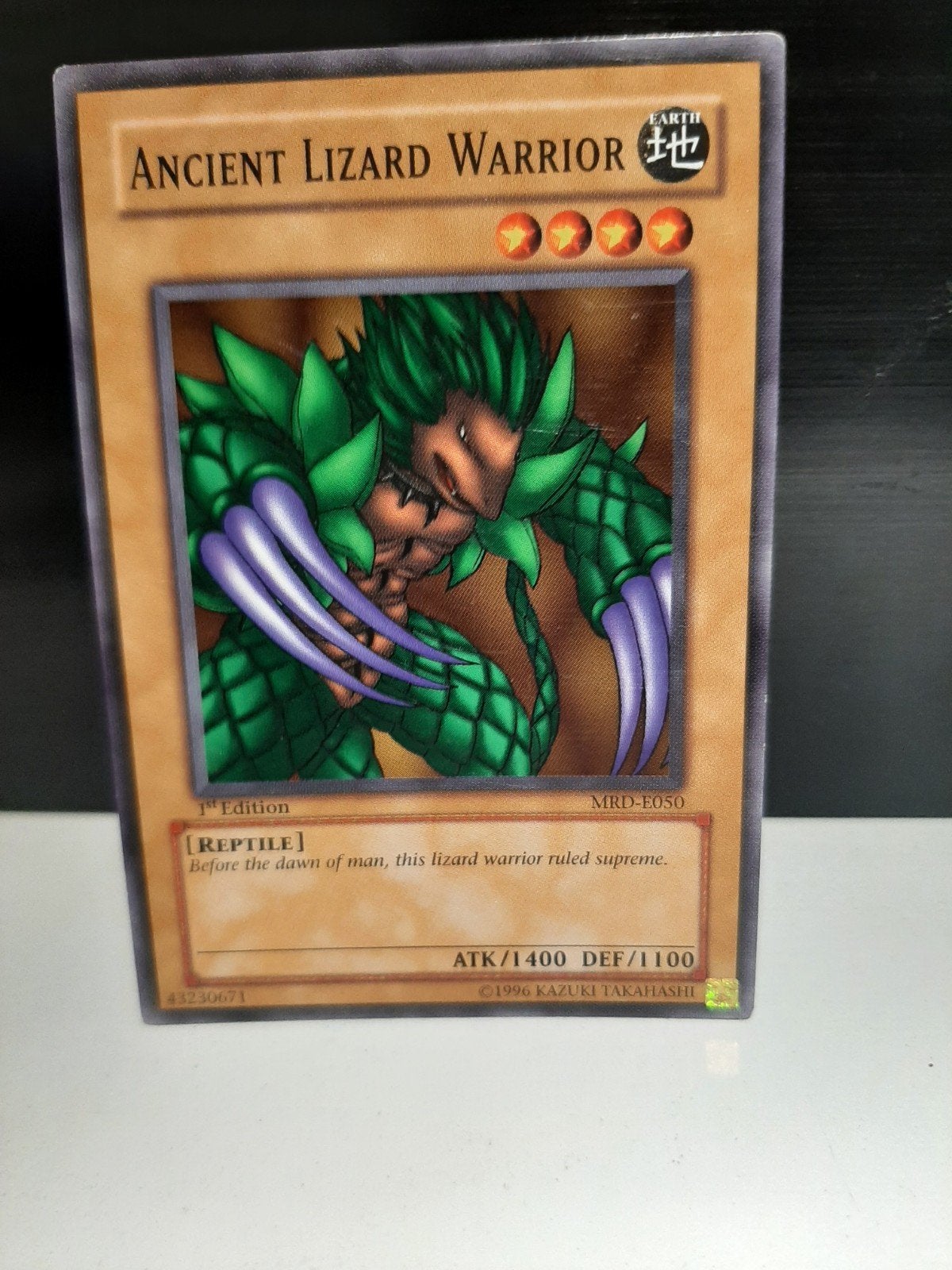 Yu-Gi-Oh! Ancient Lizard Warrior 1st Edition MRD-E050, Ophalen of Verzenden