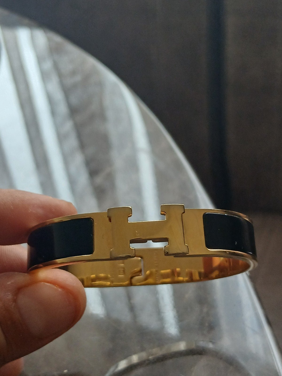Hermès Clic H Armband Zwart en Goud, Verzenden, Zo goed als nieuw, Zwart, Overige materialen