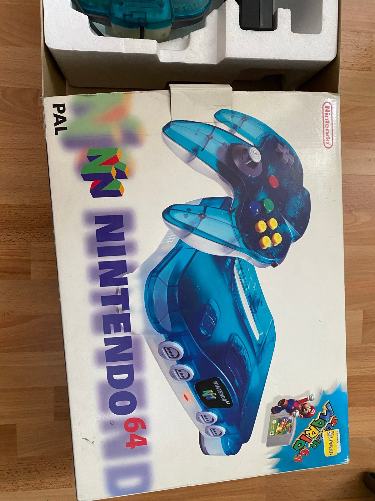 Nintendo 64 met Super Mario 64 - Transparant Blauw, Ophalen, Zo goed als nieuw, Met 1 controller, Met games