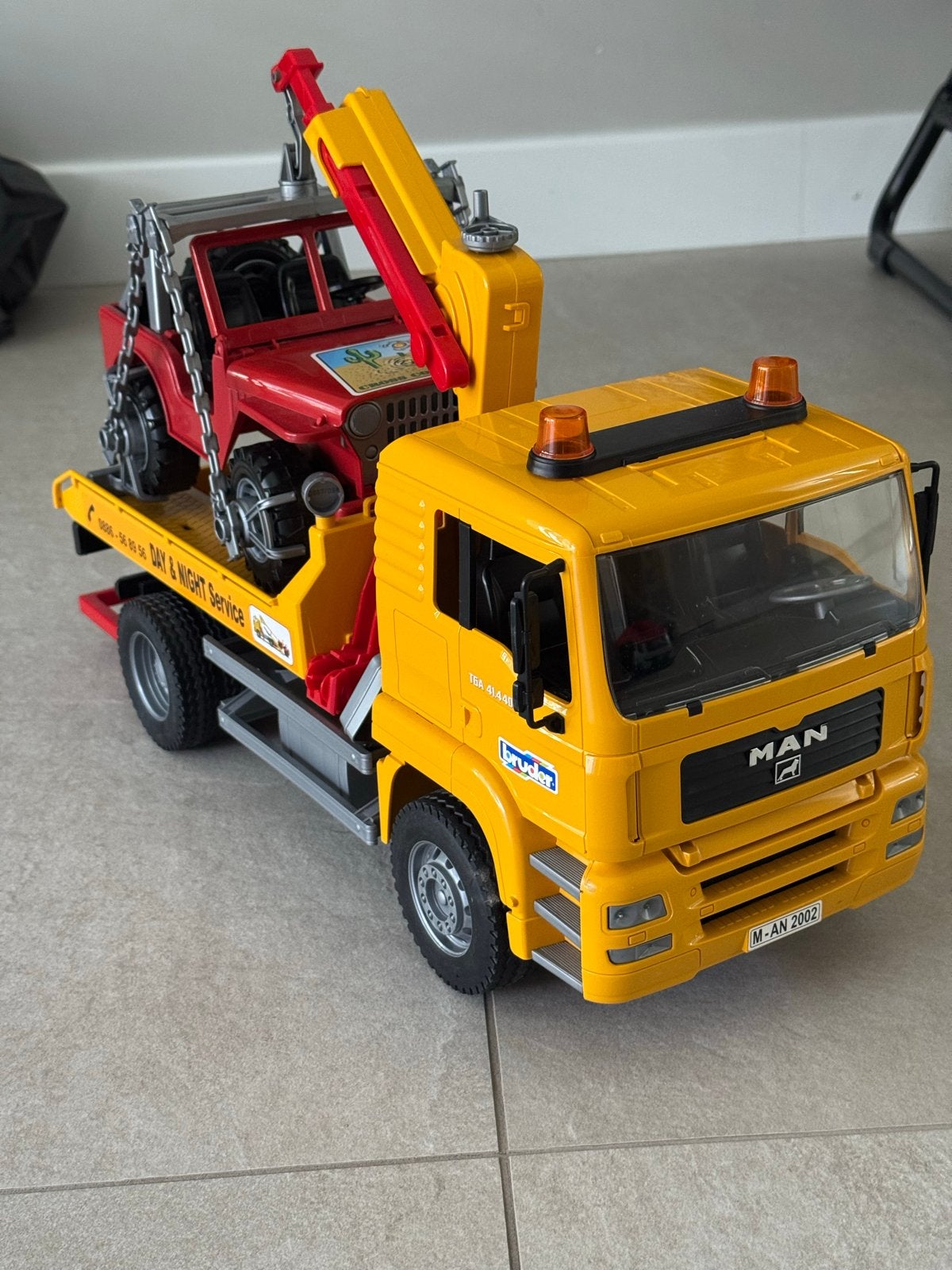 Bruder MAN takelwagen met Jeep, Kinderen en Baby's, Speelgoed | Speelgoedvoertuigen, Ophalen, Zo goed als nieuw