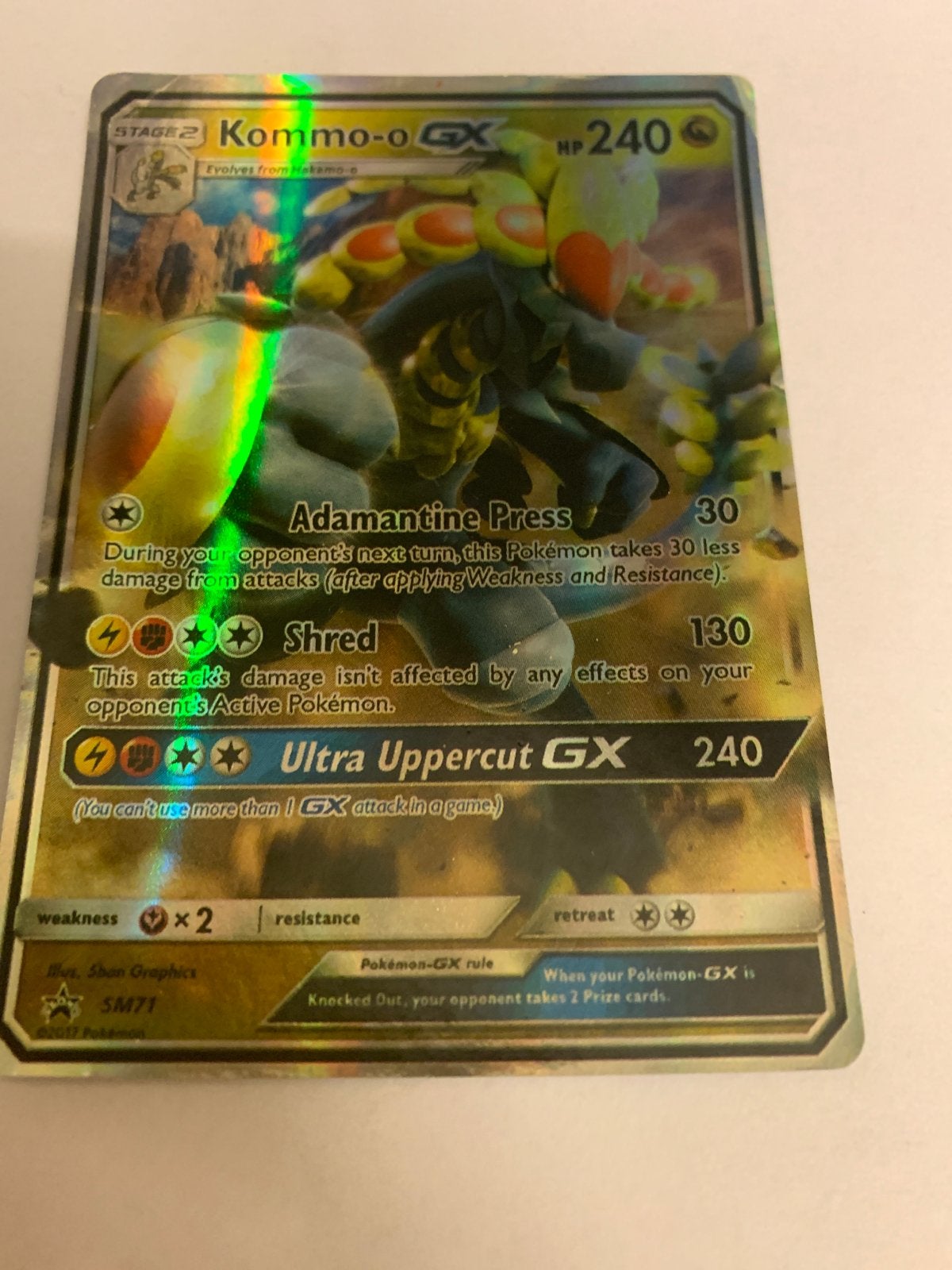Kommo-o GX Pokémon kaart SM71 Foil, Hobby en Vrije tijd, Ophalen of Verzenden, Zo goed als nieuw, Losse kaart, Foil