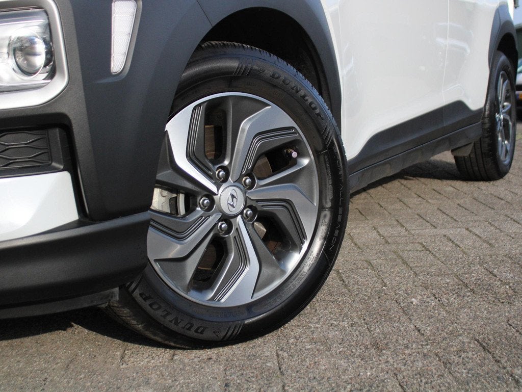Hyundai Kona 1.6 GDI HEV Comfort Navigatie, Achteruitrijcame, Auto's, Hyundai, 12 maanden, Stof, Gebruikt, Euro 6