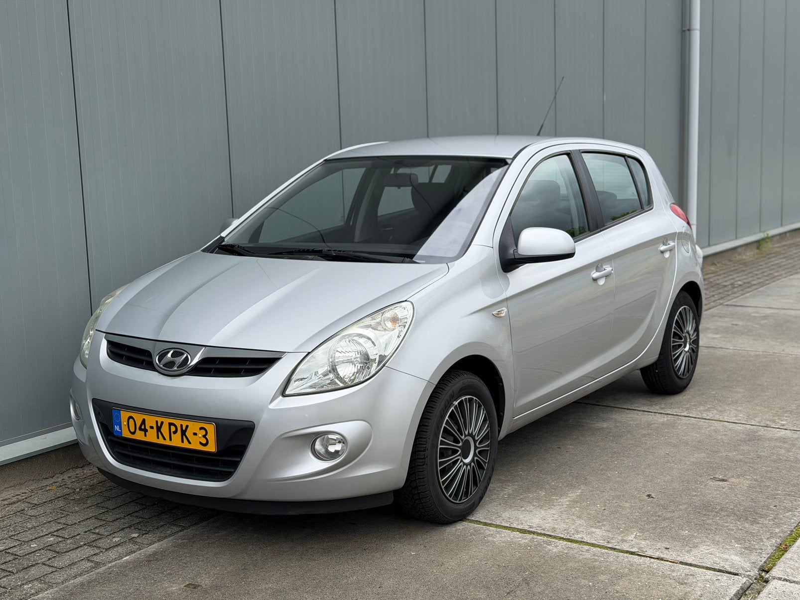 Hyundai i20 1.4 5-DRS 2010 / Airco | NAP | Trekhaak, Auto's, Voorwielaandrijving, Euro 5, 40 €/maand, Zwart