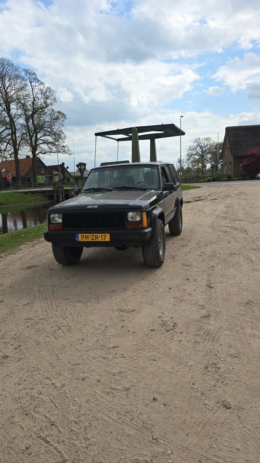 Jeep Cherokee 2.5 I Sport 4WD 1996 Zwart, Auto's, 1440 kg, 4 cilinders, Zwart, Origineel Nederlands