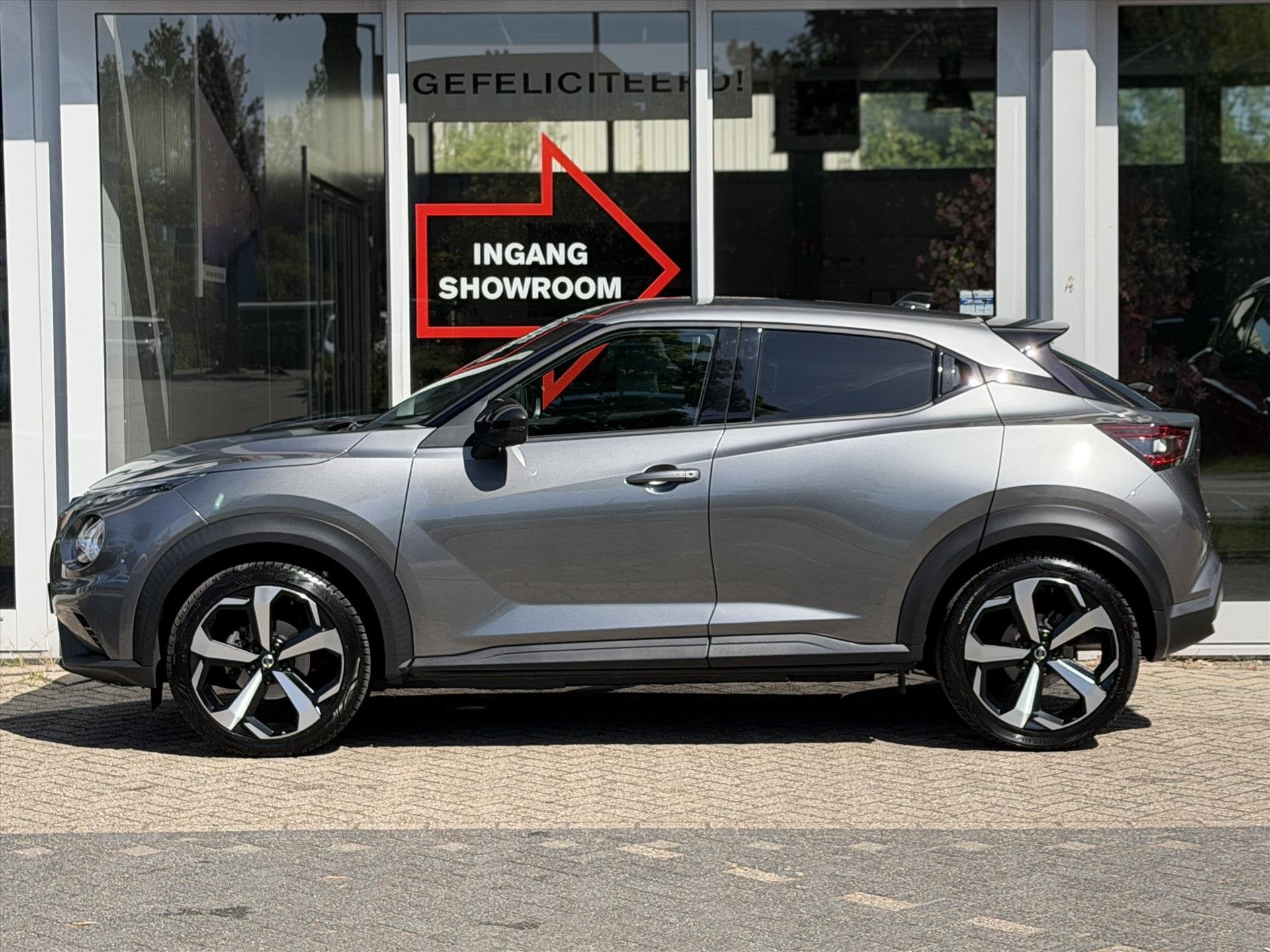 Nissan Juke 1.0 DIG-T DCT Tekna | Trekhaak | BOSE | Navigati, Leder en Stof, Bedrijf, 3 cilinders, 638 kg