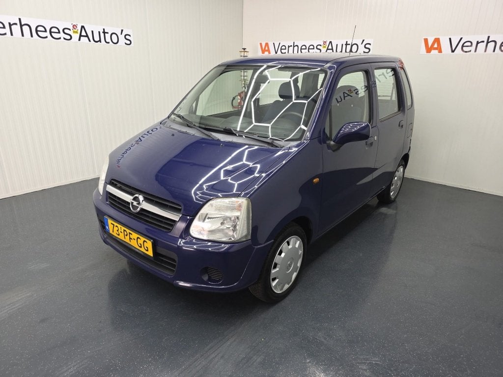 Opel Agila 1.2-16V Enjoy (bj 2004), Auto's, Voorwielaandrijving, Blauw, Origineel Nederlands, Bedrijf