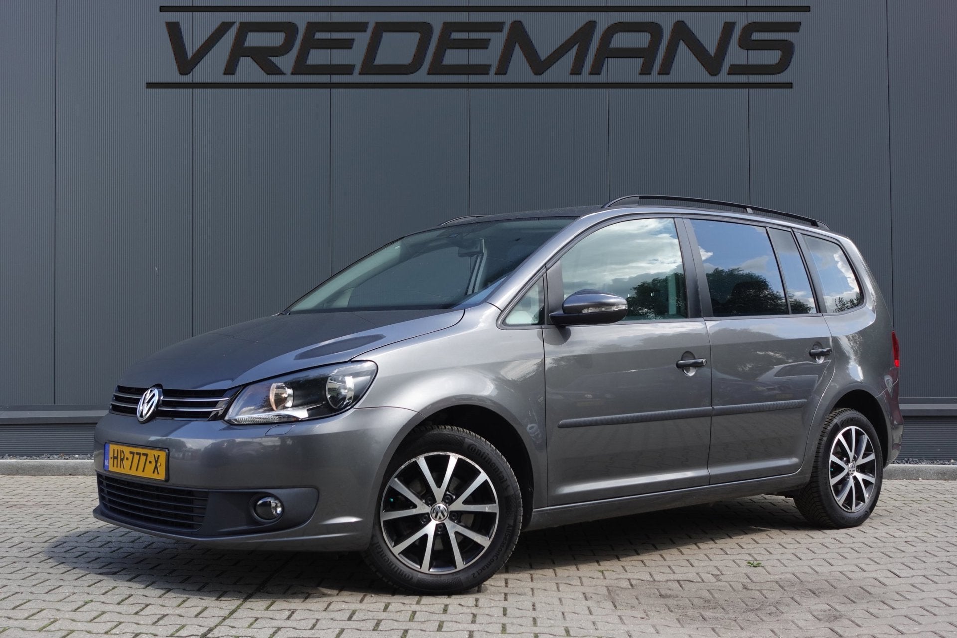 Volkswagen Touran 1.6 TDI Highline BlueMotion 7p., Euro 5, Stof, Gebruikt, Zwart