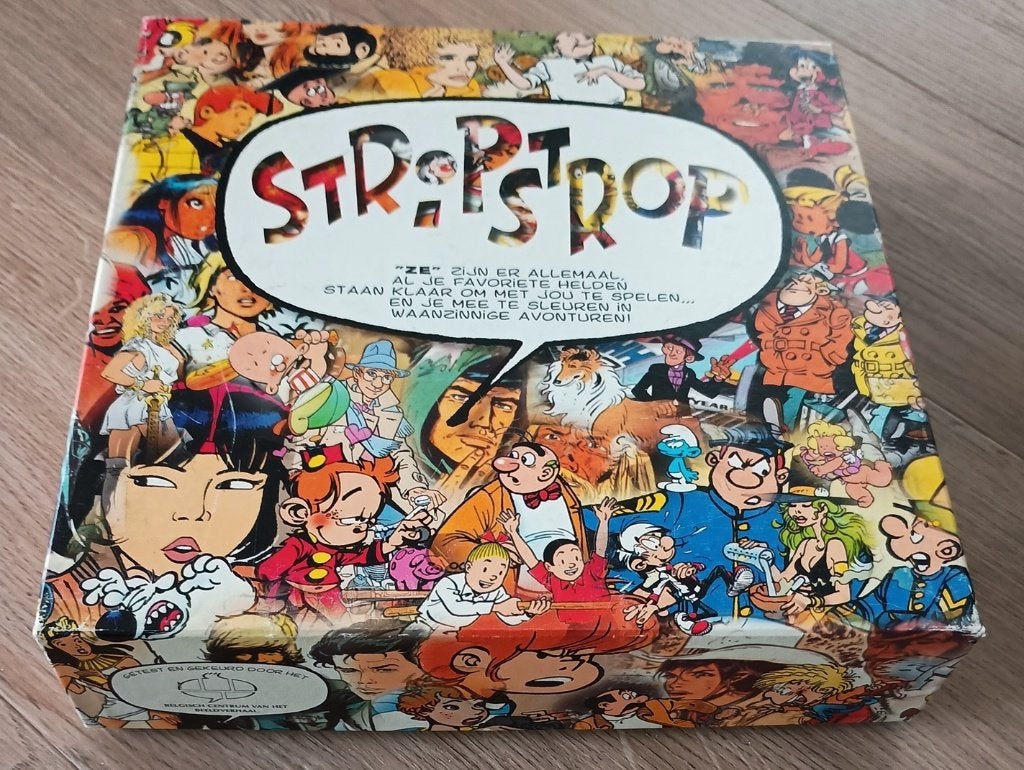 StripStrop gezelschapsspel met stripfiguren., Hobby en Vrije tijd, Gezelschapsspellen | Bordspellen, Ophalen of Verzenden, Zo goed als nieuw