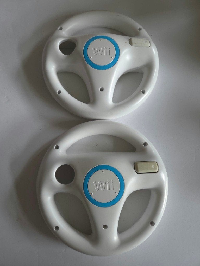 Nintendo Wii - Set van 2 Stuurtjes - Origineel, Spelcomputers en Games, Racen en Vliegen, Ophalen of Verzenden, Zo goed als nieuw