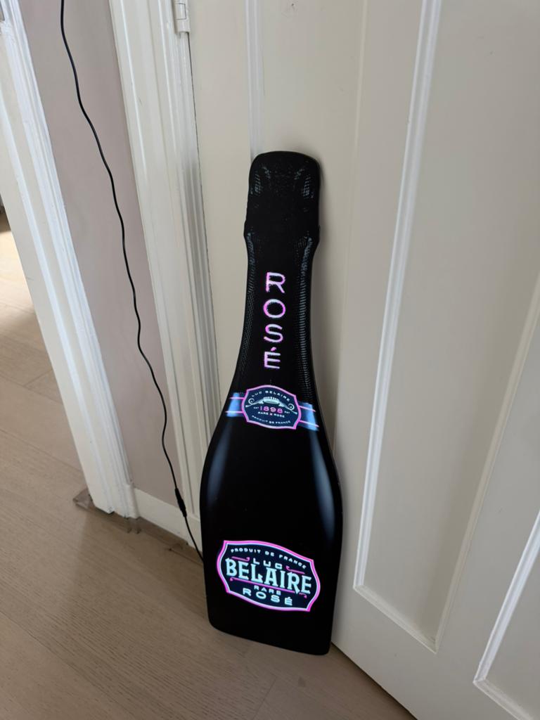 Lichtgevende champagnefles voor op de muur, Ophalen