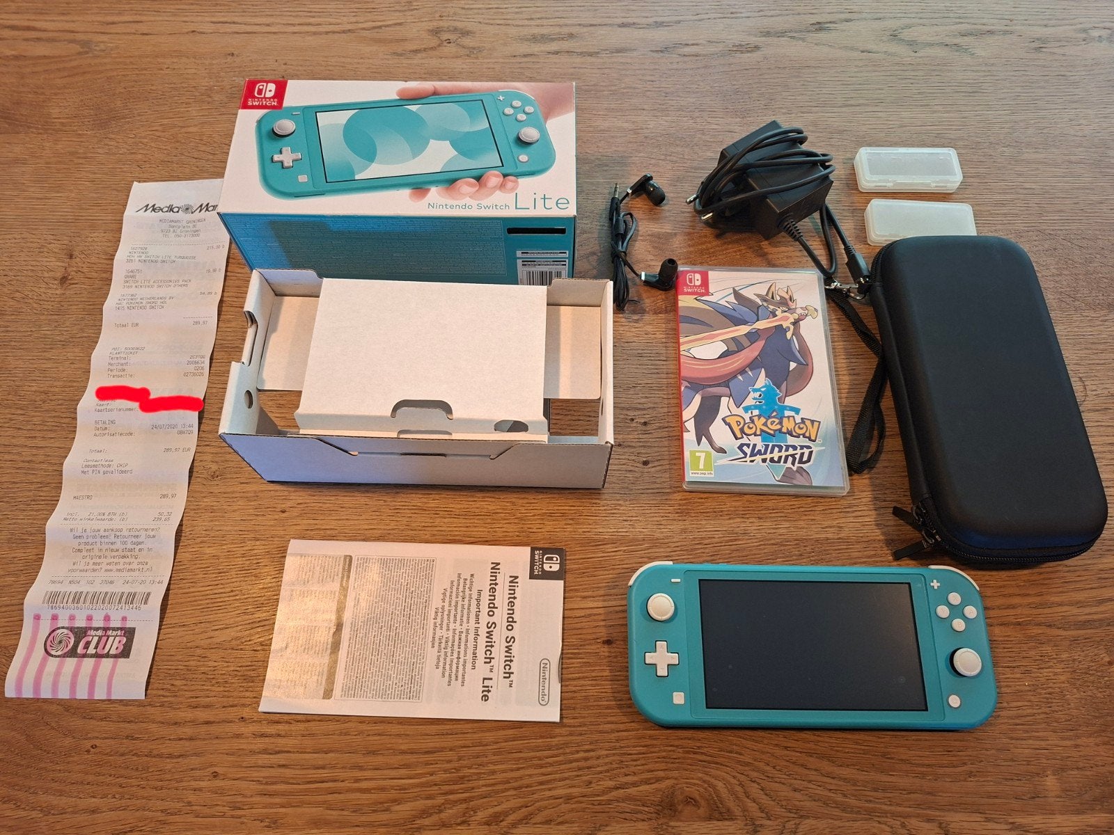 Complete Nintendo Switch Lite Turquoise + Pokémon Sword, Spelcomputers en Games, Ophalen of Verzenden, Turquoise, Gebruikt, Met beschermhoes of tas