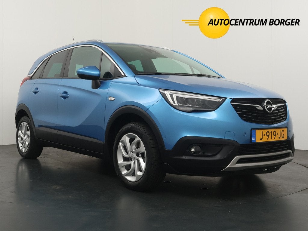 Opel Crossland X 1.2 Turbo Innovation Automaat / Navi / Clim, Auto's, Gebruikt, 1199 cc, Blauw, Automatische klimaatregeling