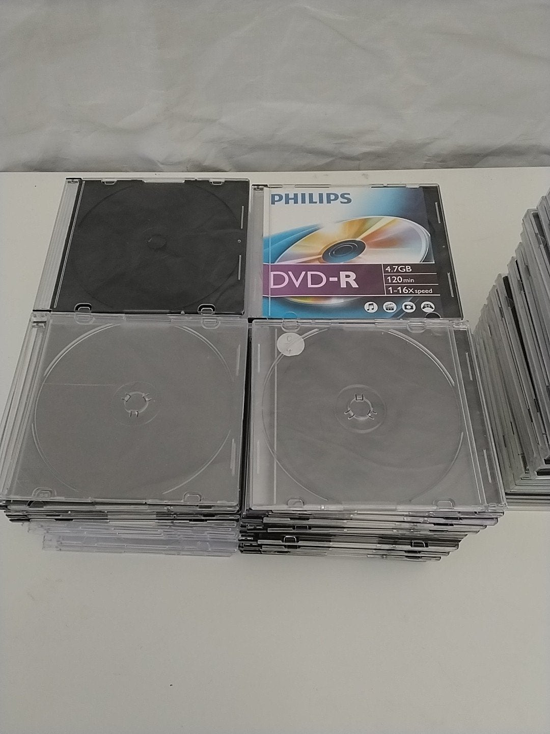 100 dunne en 21 dikke lege DVD/CD hoesjes, Ophalen of Verzenden