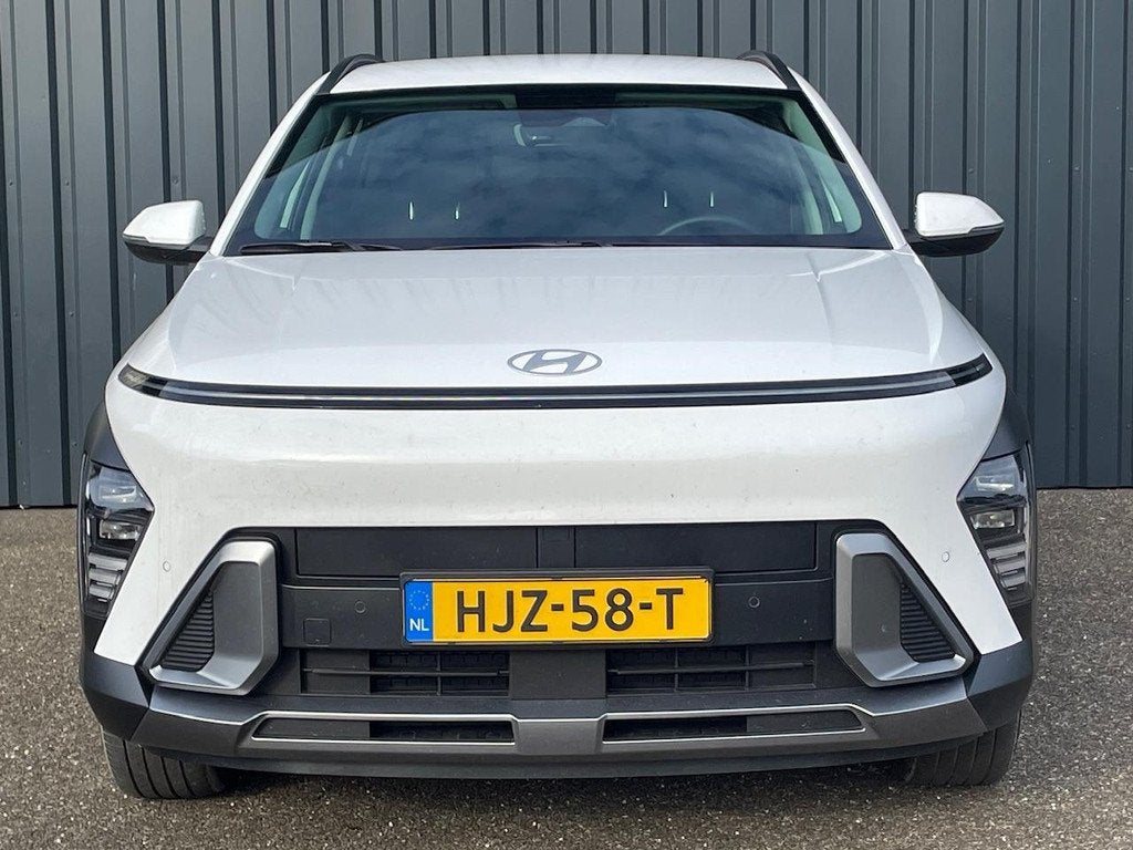 Hyundai Kona 1.6 GDI HEV 141pk DCT Comfort Smart I | SUMMER, Auto's, Hyundai, Stof, Gebruikt, 2 kWh, Wit