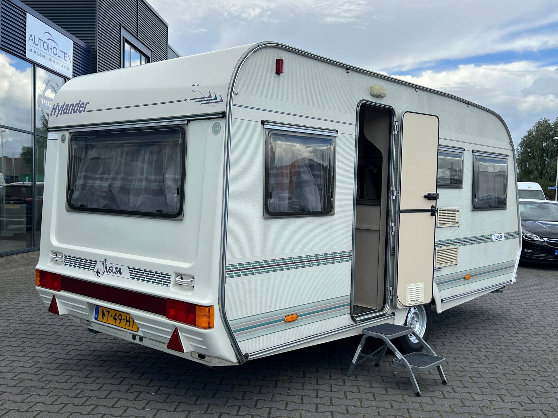 Hylander VISION 440 Dwarsbed|Rondzit+Gewone zit|Voortent, Caravans en Kamperen, Overige merken, Bedrijf, 750 - 1000 kg, 6 tot 7 meter