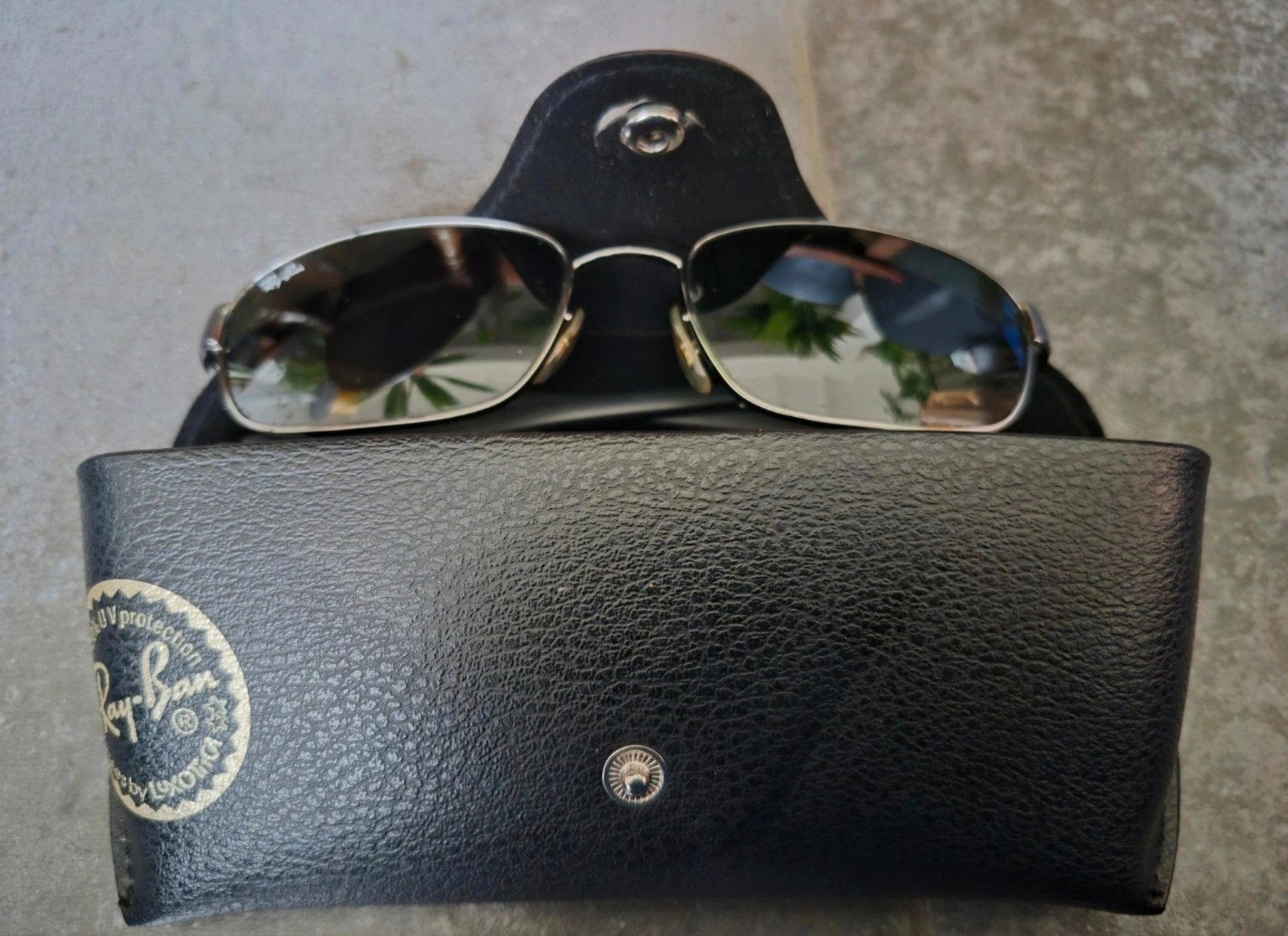 Originele Ray-Ban zonnebril universeel in zeer goede staat, Zonnebril, Ophalen of Verzenden, Zo goed als nieuw, Ray-Ban