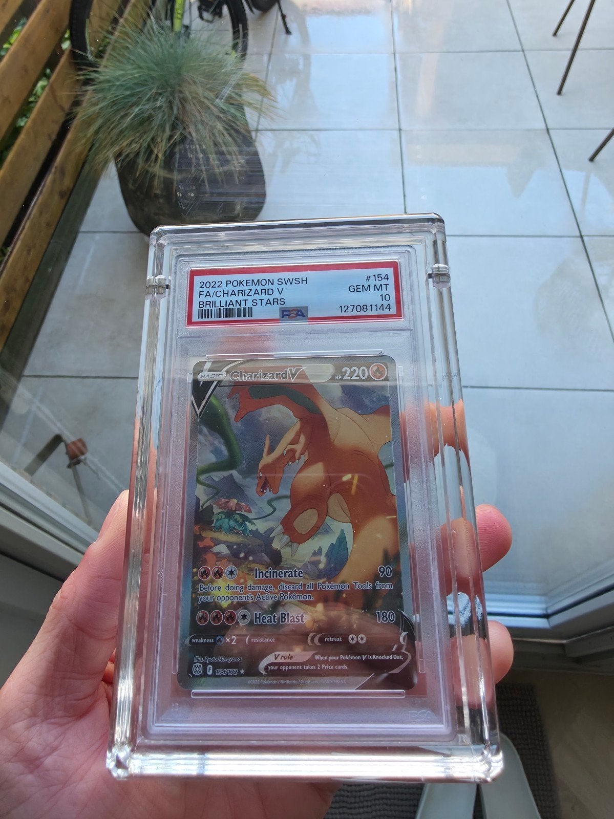 Pokémon Charizard V PSA 10 Gem Mint Brilliant Stars, Ophalen of Verzenden, Zo goed als nieuw, Losse kaart