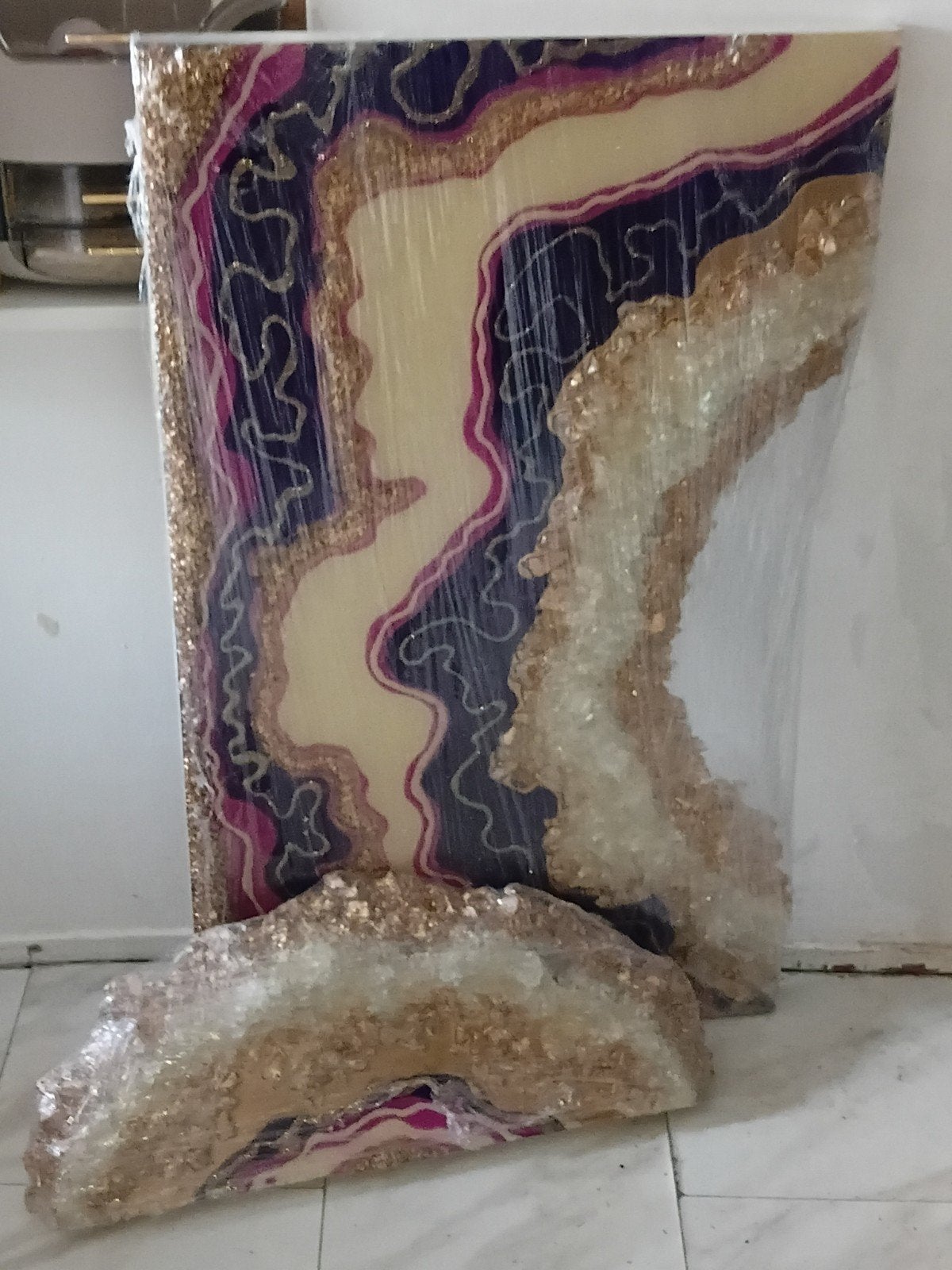 Geode epoxy schilderij, Ophalen