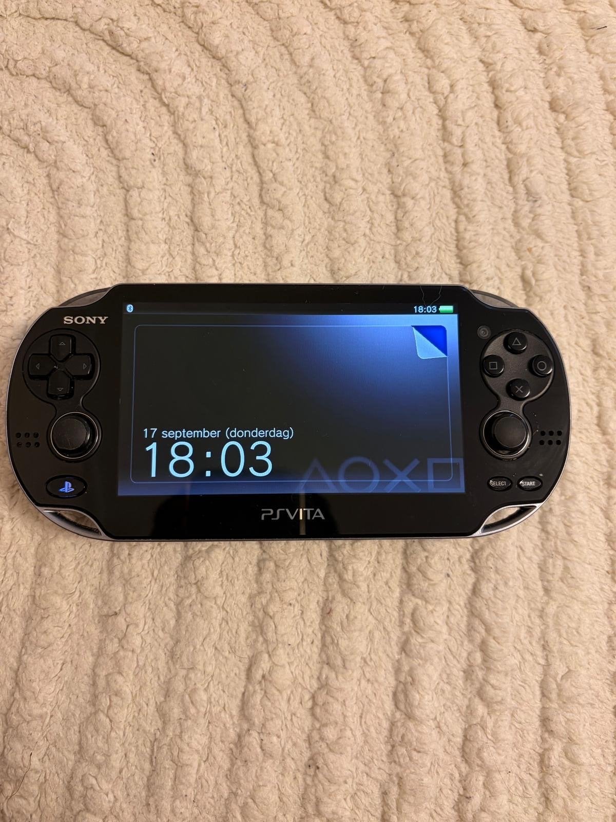 Sony PlayStation Vita PCH-1104 OLED model, Spelcomputers en Games, Ophalen, Zo goed als nieuw, Zwart