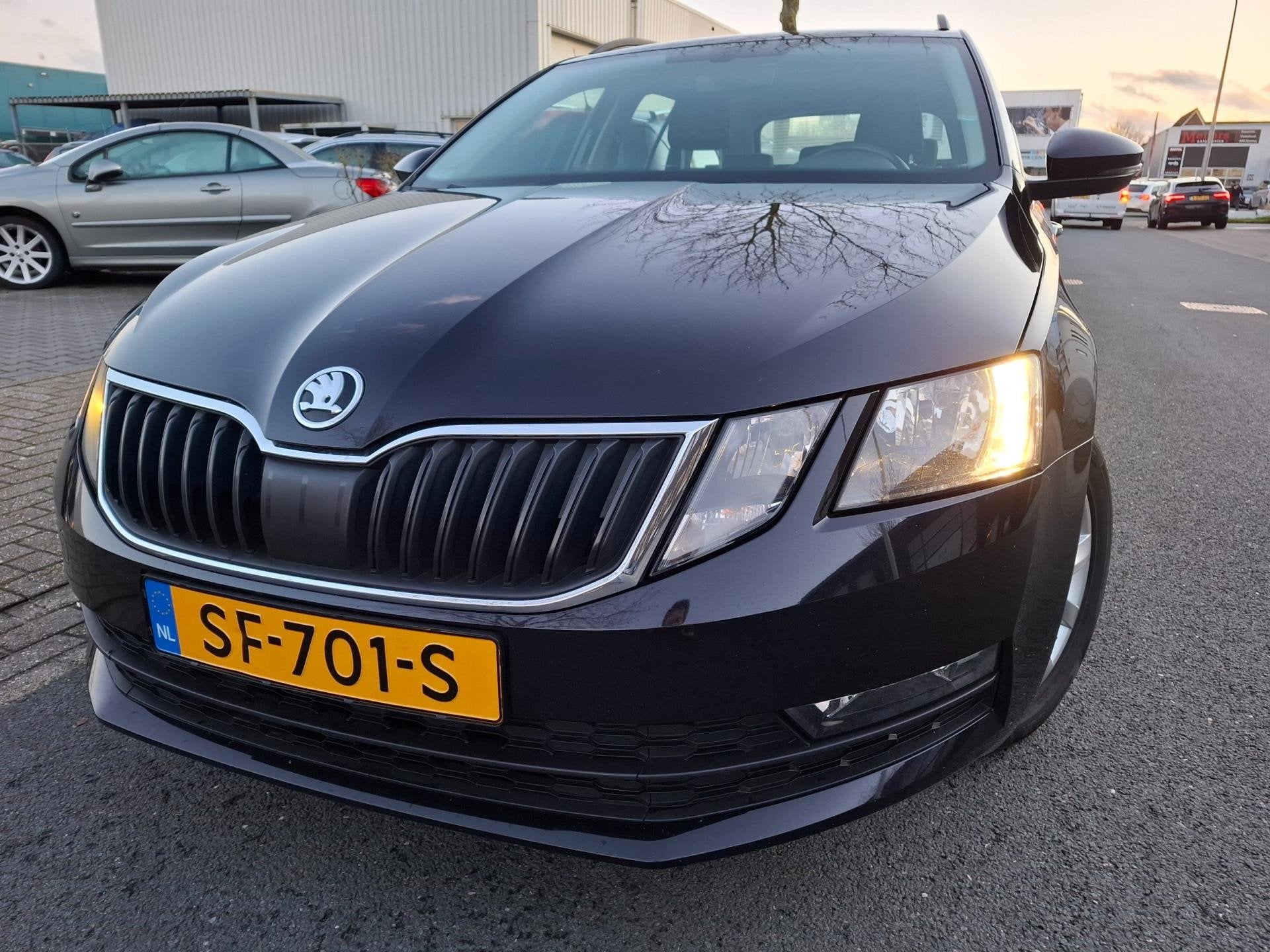 Skoda Octavia Combi 1.0 TSI Ambition Business AUTOMAAT/NAVI/, Auto's, Stof, 116 pk, Zwart, Origineel Nederlands