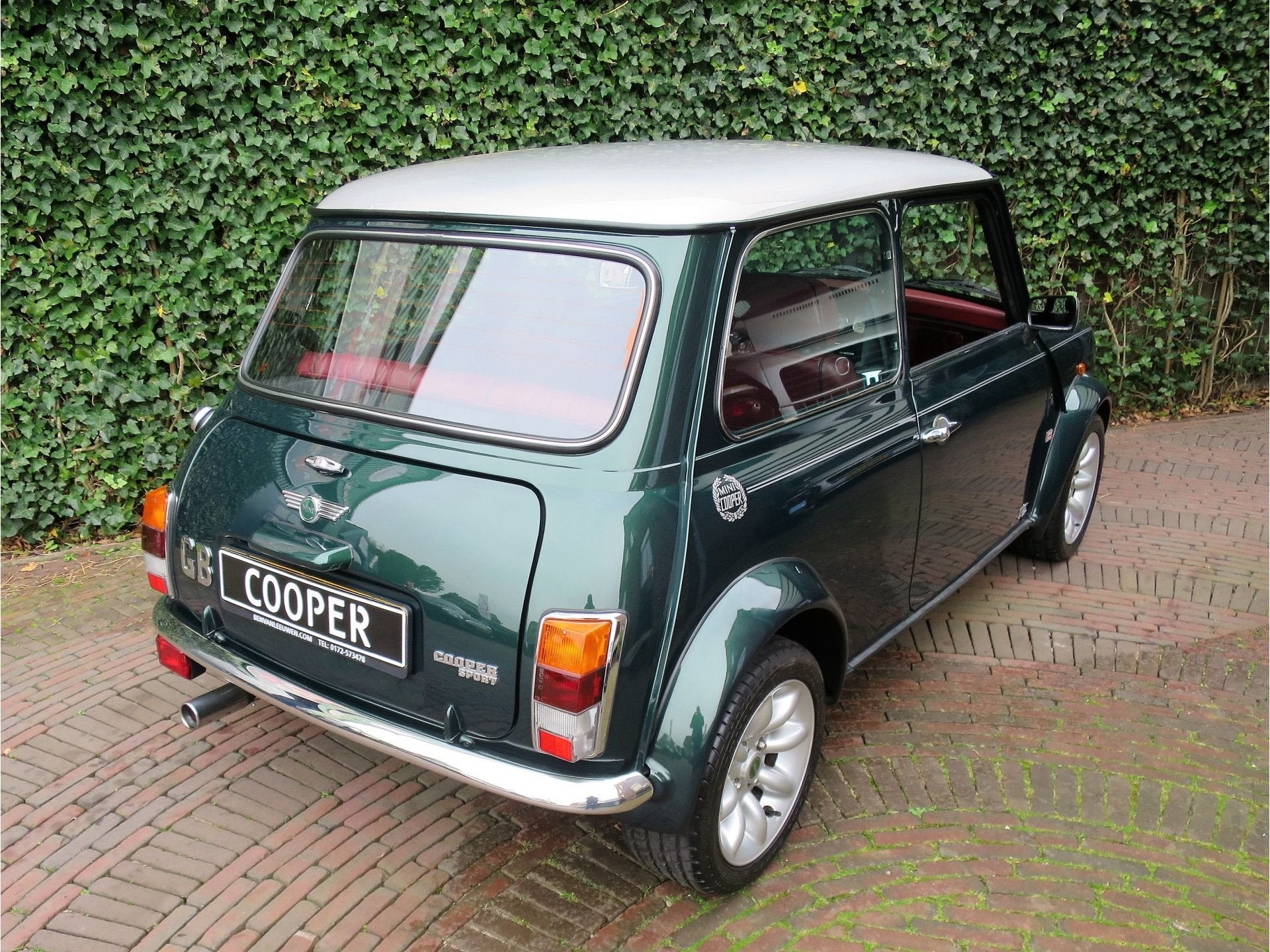 MINI Cooper Sport 1.3 MPI met leder interieur, houten dash e, Auto's, Oldtimers, Voorwielaandrijving, 12 maanden, 15 km/l, 63 pk