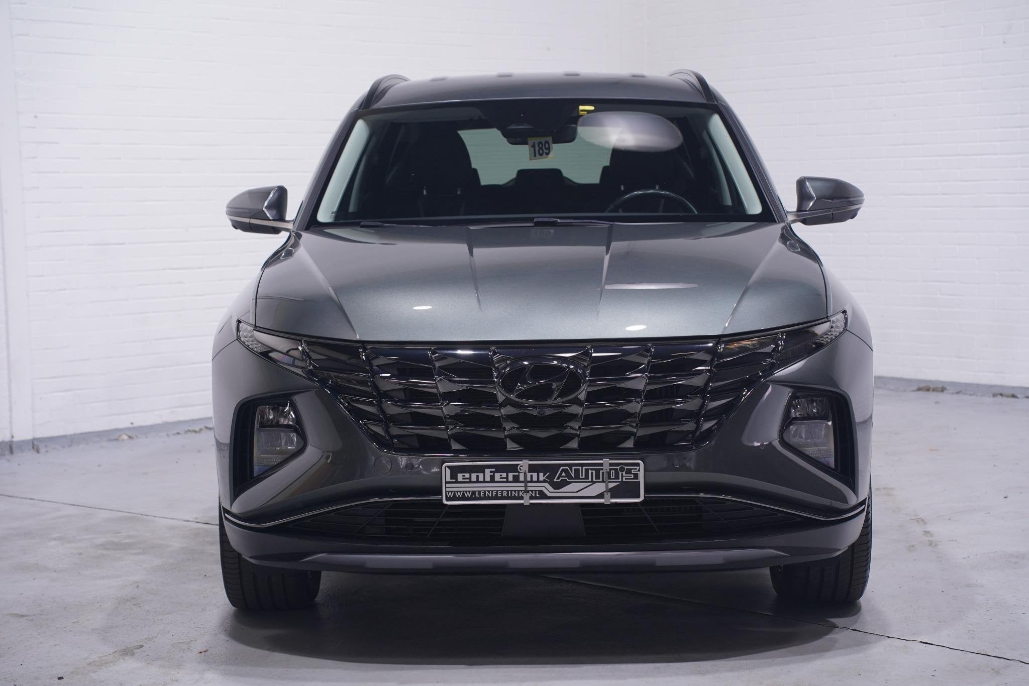 Hyundai Tucson 1.6 T-GDI HEV Premium 1e eign. NAP Navigatie, Auto's, Automatische klimaatregeling, Gebruikt, Euro 6, 4 cilinders
