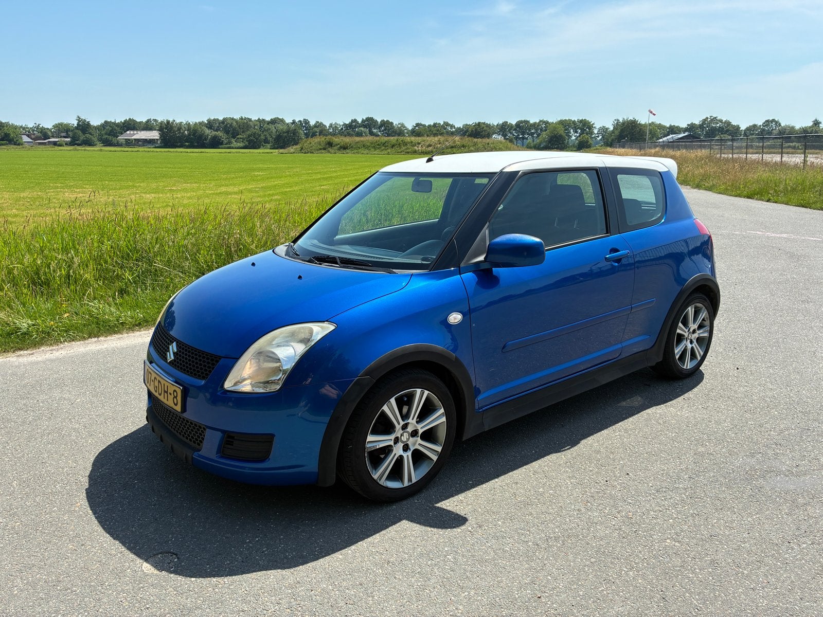 Suzuki Swift 1.3 3D 2008 Blauw, Auto's, 31 €/maand, Swift, Origineel Nederlands, Handgeschakeld