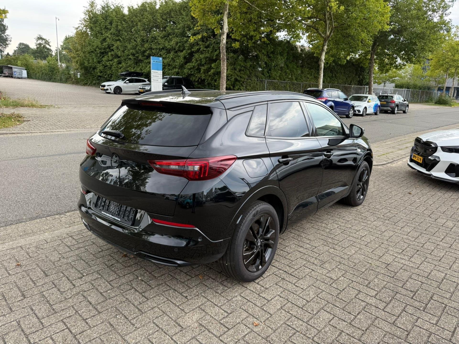 Opel Grandland 1.6 Turbo Plug-In Hybrid GS Line Dealer auto, 4 cilinders, Leder en Stof, Zwart, Bedrijf