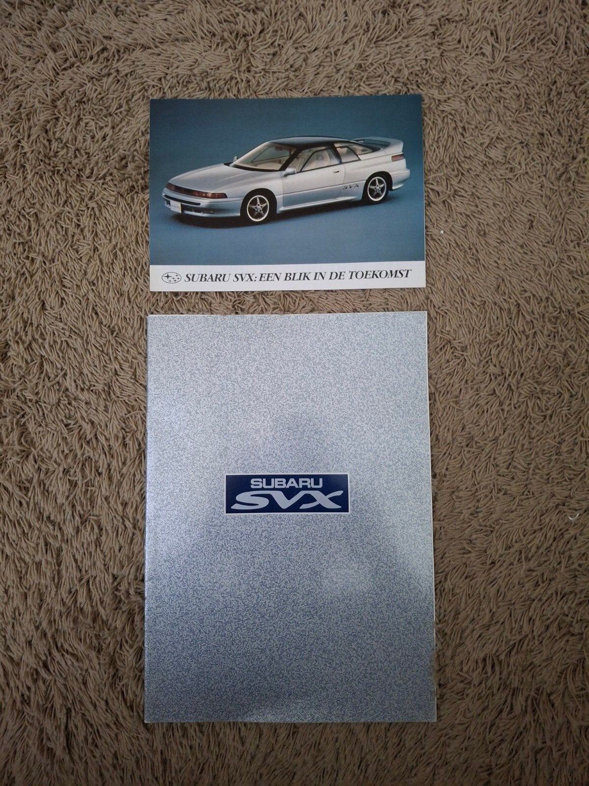 2x autofolder Subaru SVX, Verzenden, Zo goed als nieuw, Overige merken