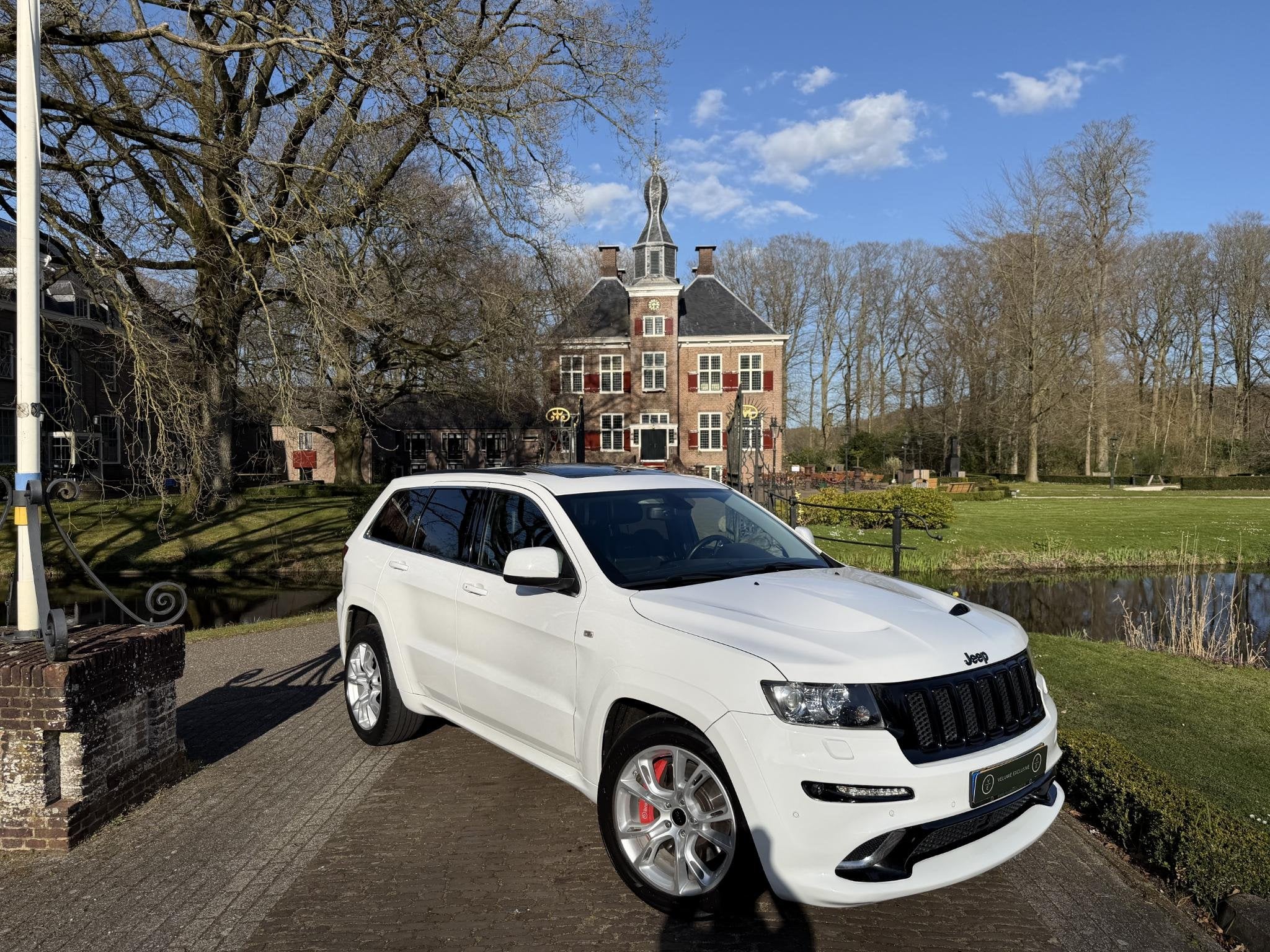 Jeep Grand Cherokee 6.4 V8 SRT8 | Pano | Volledig Onderhoude, Auto's, Automaat, Euro 5, Panoramadak, Wit