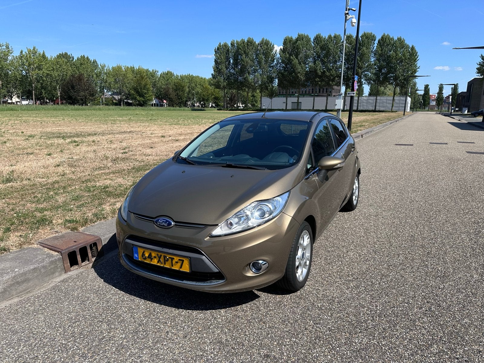 Ford Fiësta 1.25 2012 Bruin, Auto's, Ford, Voorwielaandrijving, Stof, Bruin, Origineel Nederlands