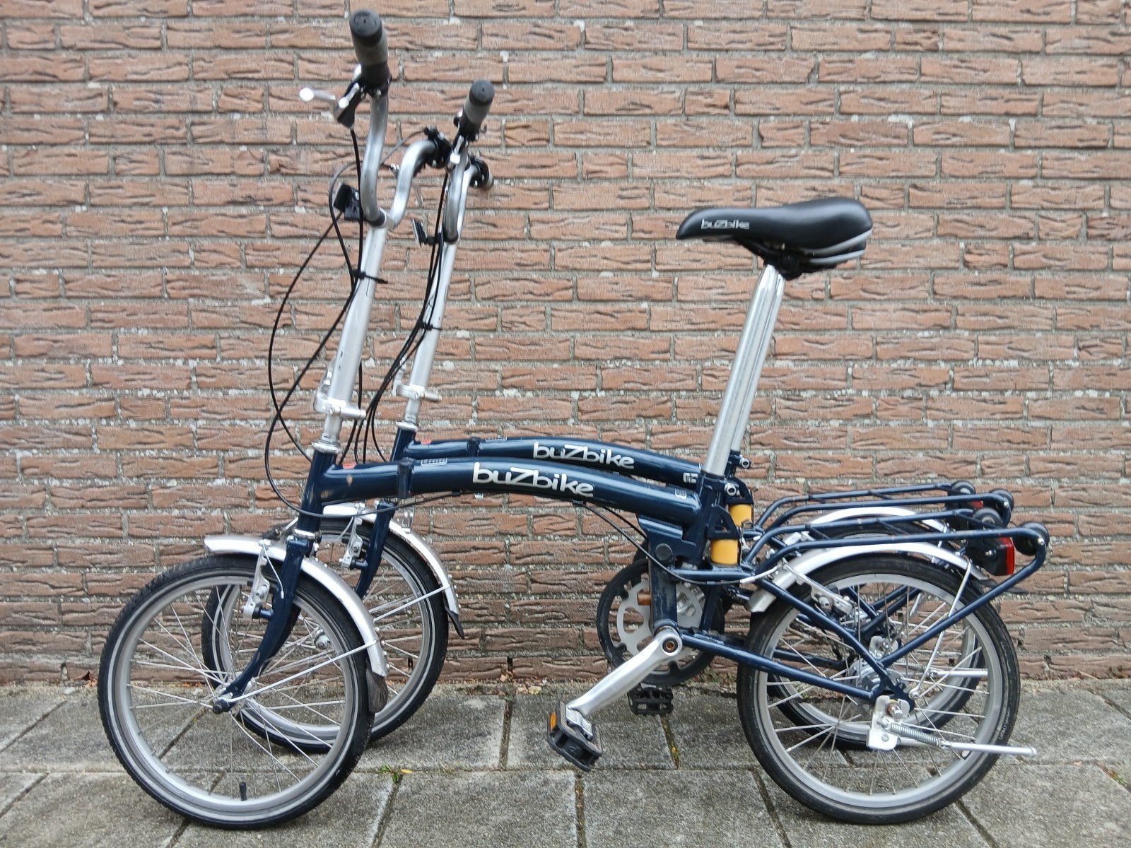 Gebruikte, goedwerkende BuzBike vouwfietsen set., Fietsen en Brommers, Fietsen | Vouwfietsen, Ophalen, Totaal opvouwbaar, Versnellingen