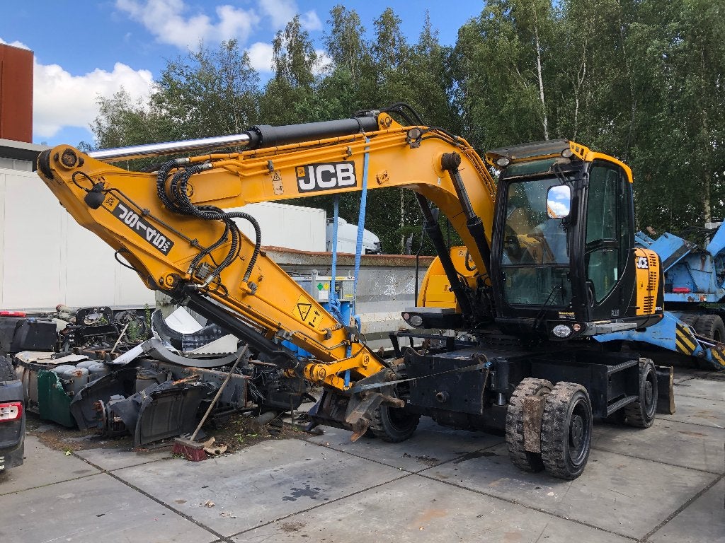 JCB JS 145W+ Mobiele graafmachine met brandschade!!!!!!, Zakelijke goederen, Machines en Bouw | Kranen en Graafmachines, Ophalen of Verzenden