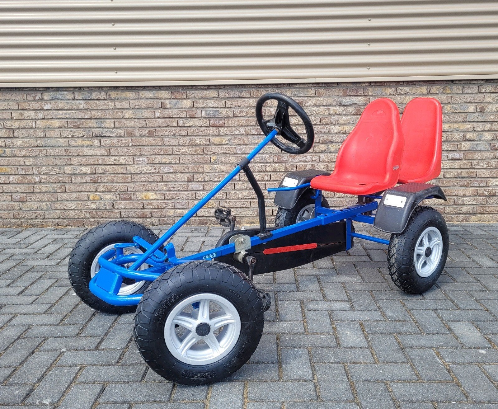 Berg skelter met nieuwe banden en optioneel duozitje, Ophalen, Zo goed als nieuw, Trapvoertuig