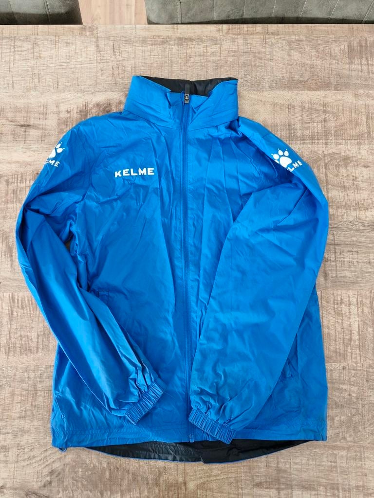 Quick Boys Kelme regenjas kinderen maat 14 blauw, Ophalen of Verzenden, Zo goed als nieuw, Kelme, Jongen of Meisje