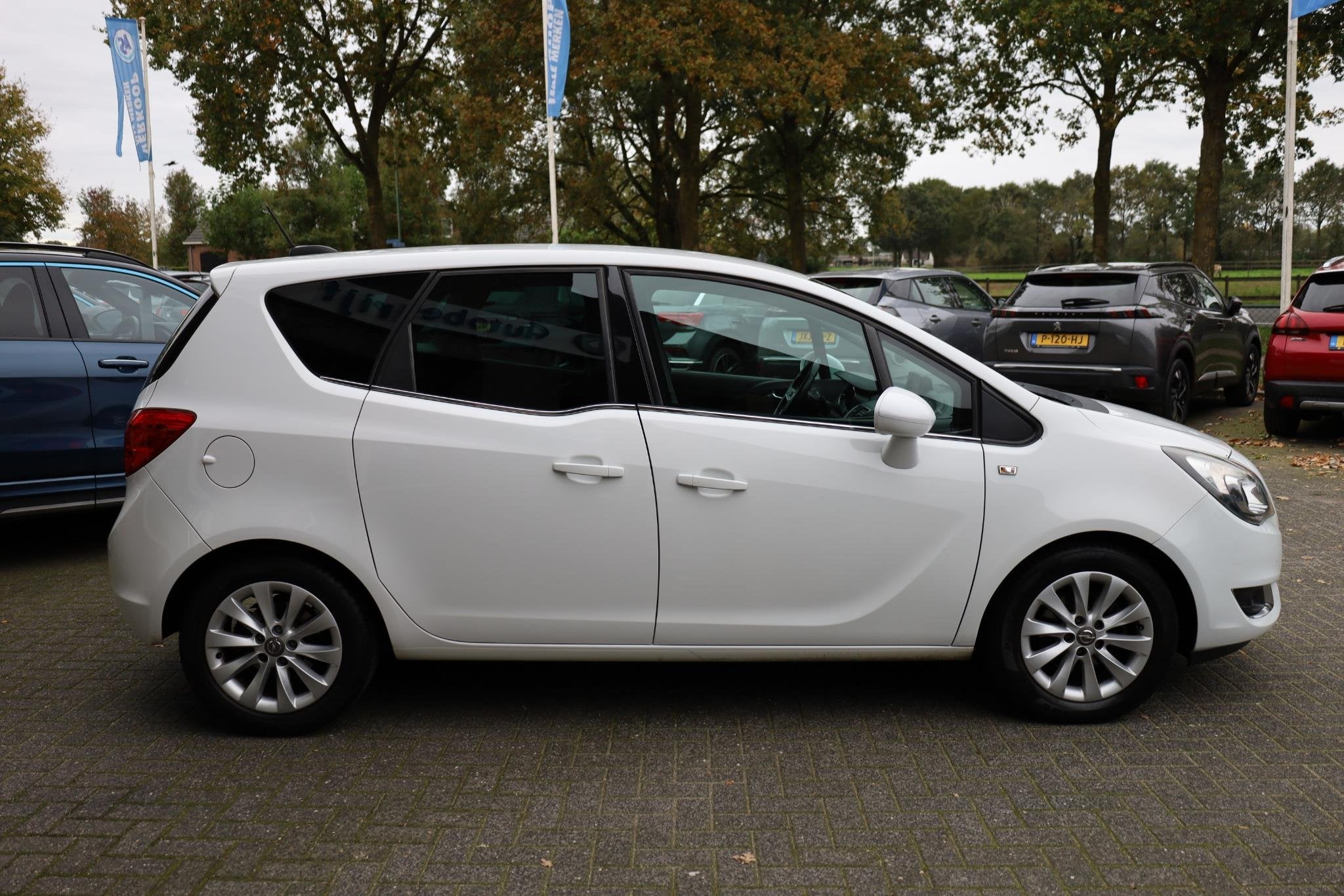 Opel Meriva 1.4 Cosmo CAMERA NAVI CRUISE CLIMA HALF-LEER 2XP, Auto's, Voorwielaandrijving, Gebruikt, 4 cilinders, 1261 kg