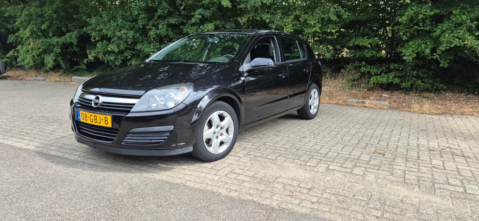 Opel Astra 1.6 2008 Zwart, Auto's, Voorwielaandrijving, 15 km/l, 4 cilinders, 1165 kg