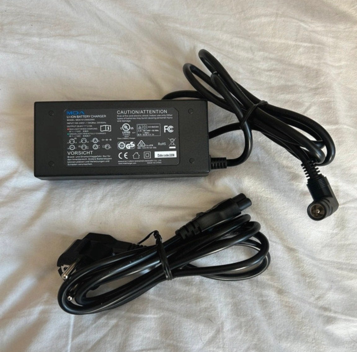 Fiets Accu oplader 24V - 2A MDA Li-ion Accu, Ophalen of Verzenden, Gebruikt