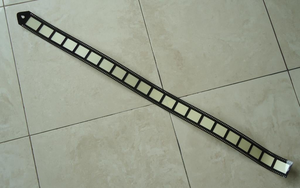Te koop kunststof fotolijst in de vorm van een filmstrip., Ophalen of Verzenden, Zo goed als nieuw
