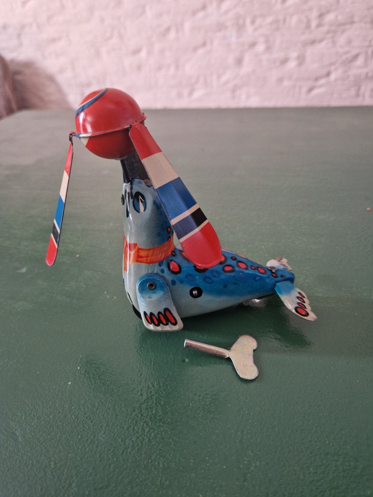 Vintage blikken zeehond speelgoed met opwindsleutel, Antiek en Kunst, Antiek | Speelgoed, Ophalen of Verzenden