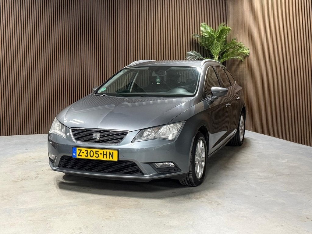 SEAT Leon ST 1.2 TSI St. First Ed (bj 2014, automaat), Auto's, Euro 5, Gebruikt, 4 cilinders, Leon