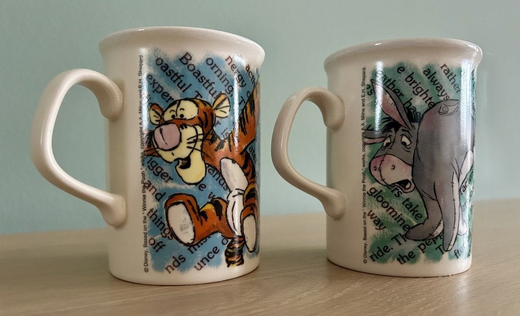Twee vintage bekers van Disney Teigetje en Iejoor, Ophalen of Verzenden, Winnie de Poeh of vrienden, Zo goed als nieuw, Servies