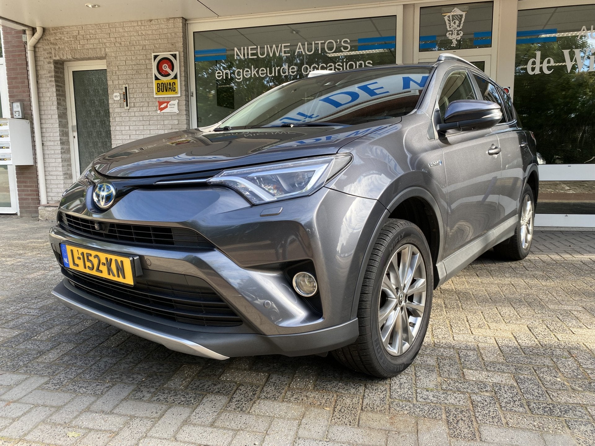 Toyota RAV4 2.5 Hybrid AWD Executive Navi Fullmap/Achteruitr, Auto's, Toyota, Automaat, Gebruikt, 1650 kg, Leder