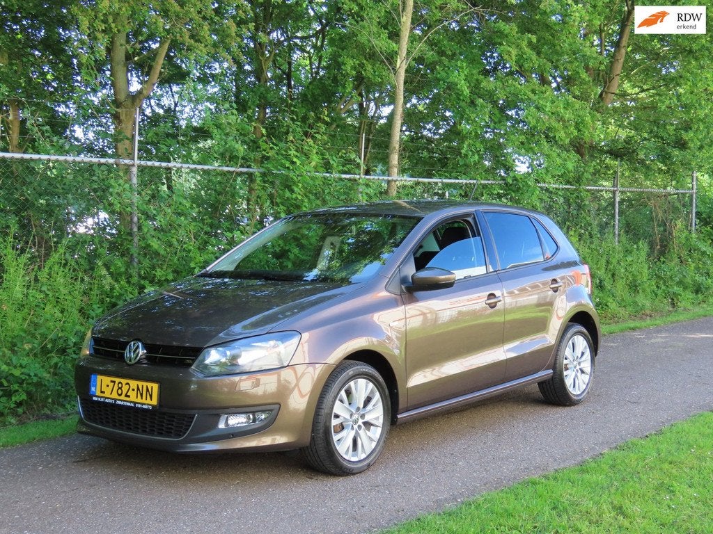 Volkswagen Polo 1.2 *Navi *Cruise *PDC *MultiMedia *Stoelver, Auto's, Voorwielaandrijving, Euro 5, Zwart, Stoelverwarming